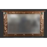 LARGE ARTS & CRAFTS COPPER MIRROR hand beaten and of rectangular shape with a top rail, inset with
