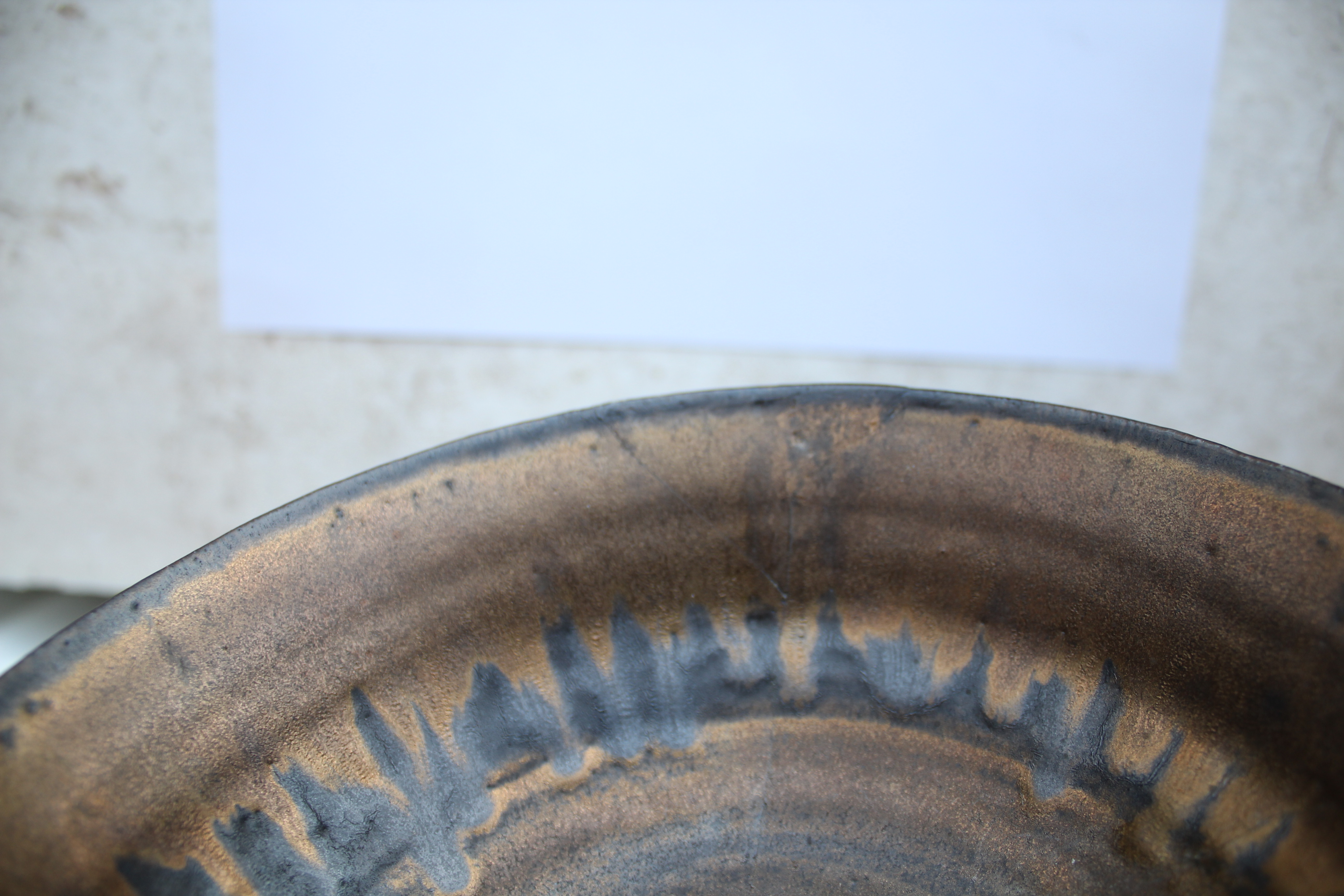 LUCIE RIE (1902-1995) - PORCELAIN BOWL a porcelain footed bowl with a bronze and black drip effect - Image 19 of 20