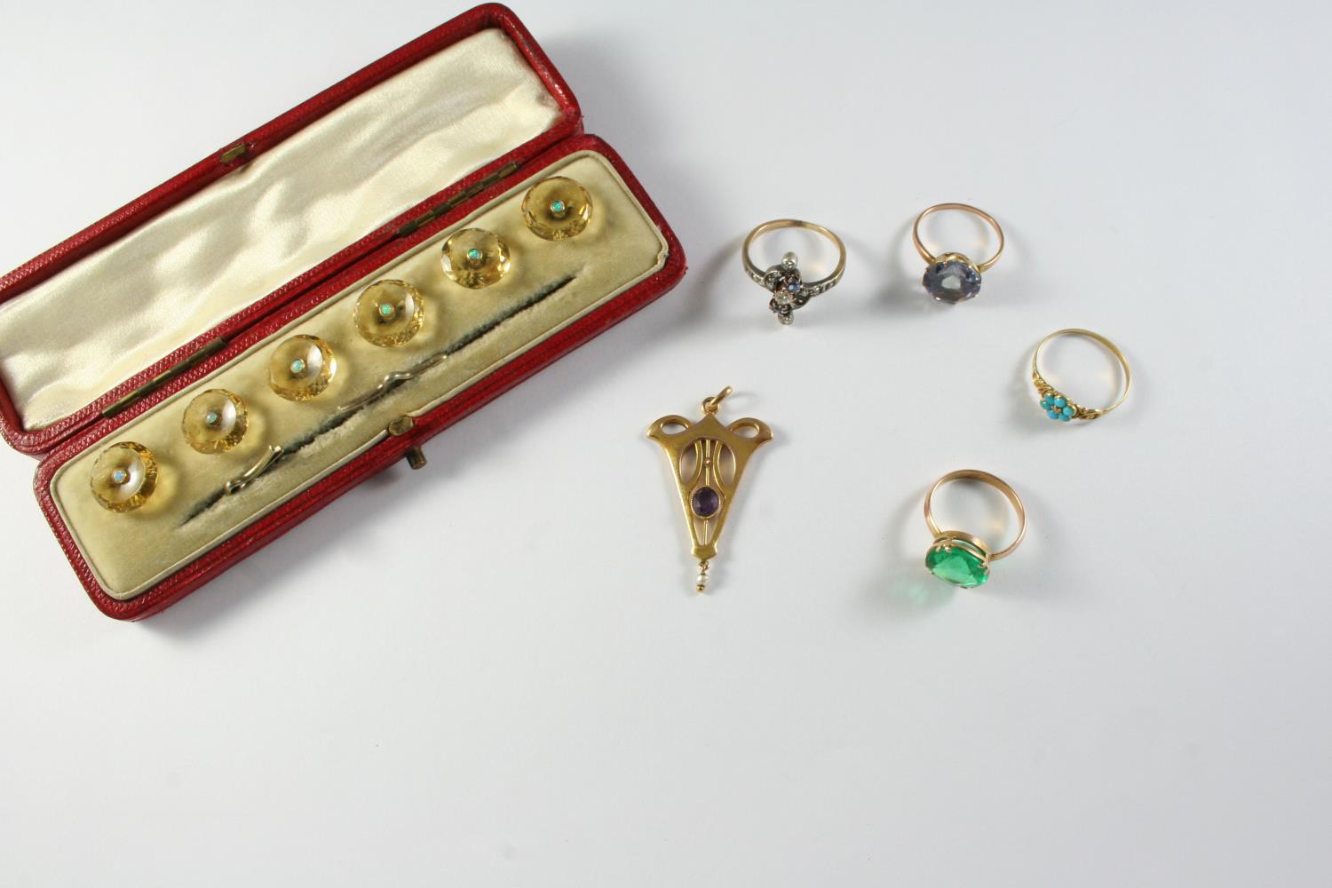 A QUANTITY OF JEWELLERY including a cased set of citrine and opal dress buttons, a sapphire and