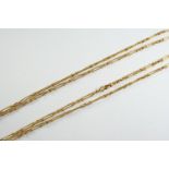 A LONG 18CT GOLD WATCH CHAIN formed with long straight links and short rope links, 144cm long, 58.