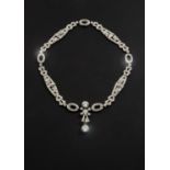 AN ART DECO DIAMOND NECKLACE formed with openwork panels of geometric design mounted with