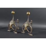 PAIR OF ART NOUVEAU FIRE DOGS - WILLIAM TONKS a pair of brass and iron fire dogs with brass