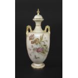 LARGE ROYAL WORCESTER LIDDED VASE a large blush ivory vase painted on both sides with various