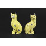 GALLE POTTERY CAT the pottery Cat with glass eyes, the yellow body painted in blue and white with