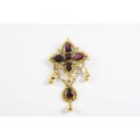AN ANTIQUE GARNET, TURQUOISE AND GOLD BROOCH PENDANT the quatrefoil ornate gold mount is set with an