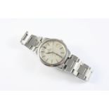 A GENTLEMAN'S STAINLESS STEEL AUTOMATIC WRISTWATCH BY OMEGA the signed circular dial with baton