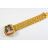 A REGENCY GOLD BRACELET the clasp mounted with a portrait miniature, depicting Mrs. William