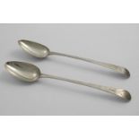 A PAIR OF GEORGE III OLD ENGLISH PATTERN BASTING SPOONS with pricked border work and engraved vacant
