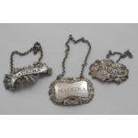 THREE VARIOUS DECORATIVE ANTIQUE "MADEIRA" WINE LABELS:- a scroll example with pierced title by