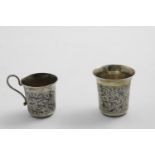 A SMALL MID-19TH CENTURY RUSSIAN SILVERGILT & NIELLOWORK BEAKER Moscow 1846 and a smaller niellowork