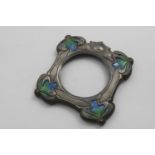 THE FRONT OF AN EDWARDIAN ART NOUVEAU MOUNTED WOODEN PHOTOGRAPH FRAME with enamelled decoration in