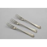 A SET OF THREE GEORGE I HANOVERIAN THREE-PRONG DESSERT FORKS crested, by Paul Hanet, London 1724;