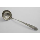 AN EDWARDIAN IRISH, BRIGHT-CUT AND STAR PATTERN SOUP LADLE with a fluted bowl, maker's mark "JS",