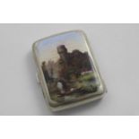 A VICTORIAN CIGARETTE CASE decorated on the cover in polychrome with a view of Warwick Castle on the