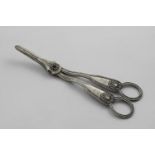 A PAIR OF VICTORIAN FIDDLE, THREAD & SHELL PATTERN GRAPE SHEARS crested, by Francis Higgins,
