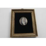 A GEORGE III MINIATURE PORTRAIT OF A GENTLEMAN in a navy blue coat with a white silk scarf in a
