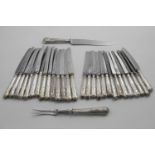 A LATE 20TH CENTURY SET OF FOURTEEN KING'S PATTERN TABLE KNIVES Fourteen side knives and a carving