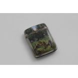 AN EDWARDIAN VESTA CASE enamelled on the front in polychrome with a fox in a forest clearing,