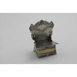 A LATE 19TH / EARLY 20TH CENTURY RUSSIAN PARCELGILT THRONE SALT with pan-Slavic decoration, a