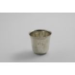 A LATE 18TH CENTURY FRENCH PROVINCIAL BEAKER of campana form with incised reeding below the rim,