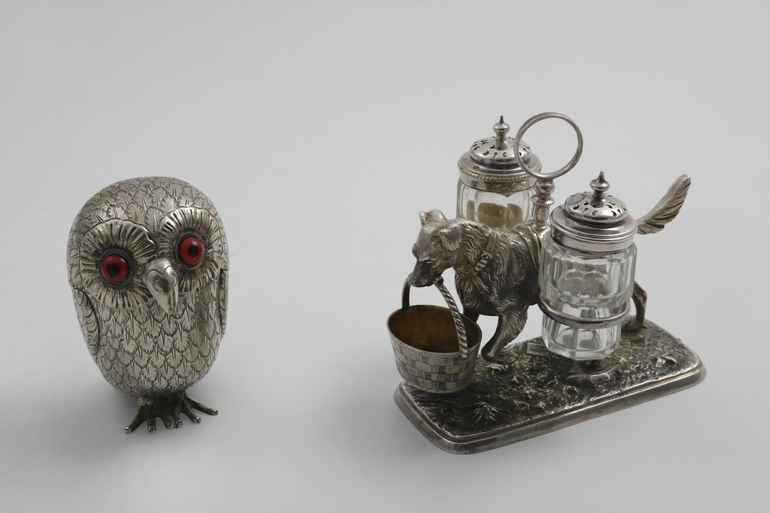 A VICTORIAN NOVELTY ELECTROPLATED MUSTARD POT in the form of an owl with coloured glass eyes and a