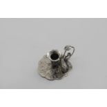 A WILLIAM IV SMALL NATURALISTIC CHAMBERSTICK with a conical snuffer & detachable nozzles, by