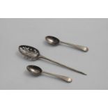 A GEORGE III MOTE SPOON and a pair of George III miniature or snuff spoons with bright-cut