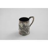 A LATE 19TH CENTURY CHINESE SMALL MUG with a simulated bamboo handle and applied prunus, finches and