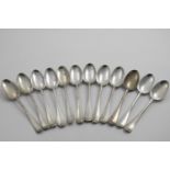 A SET OF TWELVE GEORGE III SCOTTISH TABLE SPOONS Hanoverian pattern, crested and initialled, by