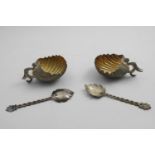 A PAIR OF INDIAN SHELL-SHAPED SWEETMEAT DISHES with gilt interiors, winged beast handles and two