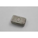 A GEORGE IV ENGRAVED SNUFF BOX rectangular with rounded corners and a trelliswork pattern with a
