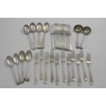 A LATE VICTORIAN PART SERVICE OF OLD ENGLISH PATTERN FLATWARE TO INCLUDE:- Eleven table forks,