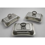 AN EARLY VICTORIAN SET OF THREE RECTANGULAR ENTREE DISHES AND COVERS cushion-shaped with rounded
