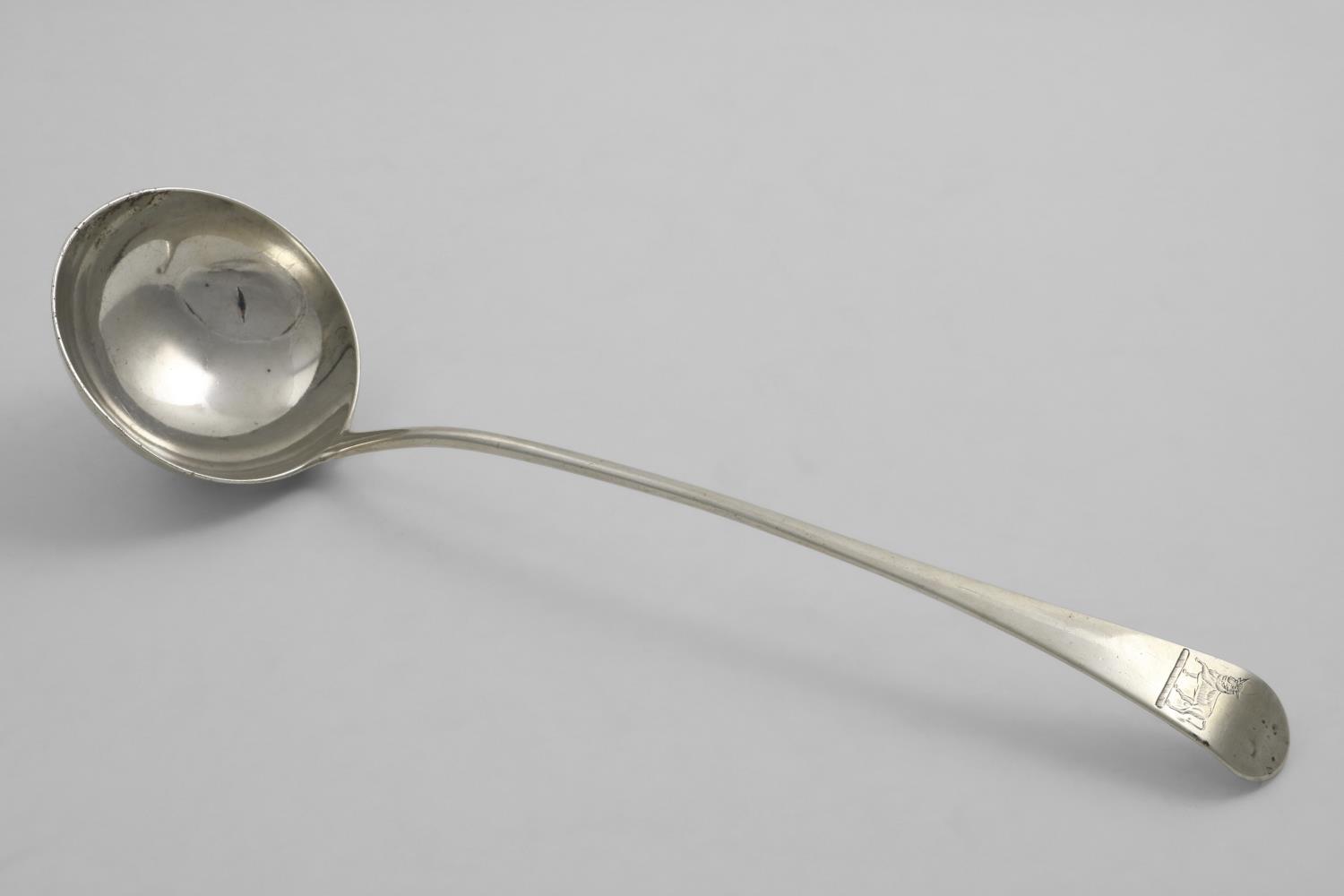 A GEORGE III OLD ENGLISH PATTERN SOUP LADLE crested, by Thomas Wallis, London 1796; 13.2" (33.5