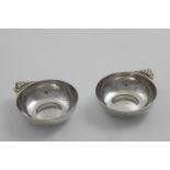 A PAIR OF HANDMADE ART DECO NUT DISHES with mounted ivory handles, by R.E.Stone, London 1931 (with