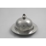 AN ART & CRAFTS ELECTROPLATED MUFFIN DISH & COVER with a hammered finish, the wirework finial set