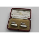 AN EDWARDIAN CASED PAIR OF MENU CARD HOLDERS each in the form of a woodcock or snipe with red gem-