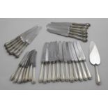 A SET OF TWELVE LATE 20TH CENTURY NORTH AMERICAN TABLE KNIVES with stainless steel blades and