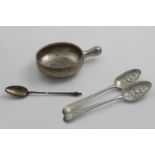 A CONTINENTAL NUT DISH with a stubby, baluster handle, a pair of George III later-decorated or "