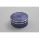 AN EARLY 20TH CENTURY CIRCULAR BOX & COVER decorated in translucent mauve enamel over an engine-