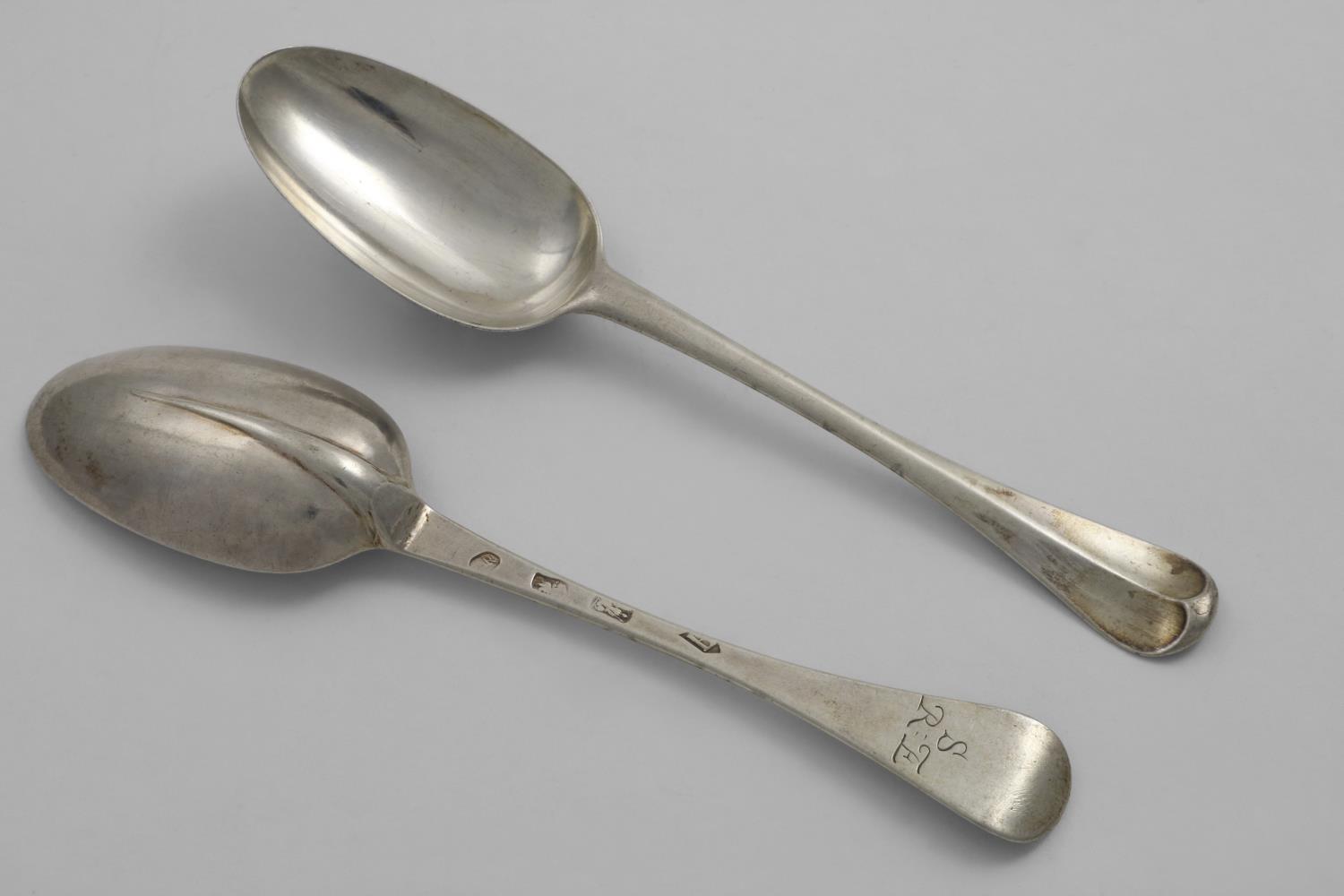 A PAIR OF GEORGE I HANOVERIAN PATTERN TABLE SPOONS with plain moulded rattails and the initials "