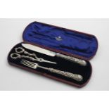 A VICTORIAN CASED DESSERT SERVING KNIFE & FORK & A PAIR OF GRAPE SHEARS with vine-decorated