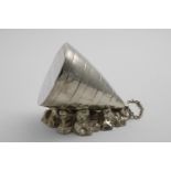 A VICTORIAN ELECTROPLATED NOVELTY SPOON WARMER in the form of a cone-shaped buoy on the rocks, by