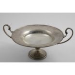 AN EDWARDIAN TWO-HANDLED PEDESTAL DISH OR TAZZA with a plain circular shallow bowl, by Williams