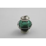 A LATE VICTORIAN MOUNTED GREEN GLASS TABLE LIGHTER resembling a ship's starboard lantern with a