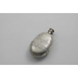 AN EARLY VICTORIAN SMALL OVAL SPIRIT FLASK with engraved decoration, two vacant cartouches, a