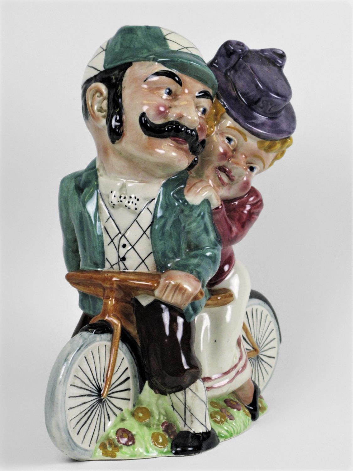 A William Shorter & Son, 'Daisy Bell' Electric Lamp-holder with Daisy and her beau seated on a