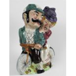 A William Shorter & Son, 'Daisy Bell' Electric Lamp-holder with Daisy and her beau seated on a