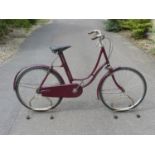 A Gladiator Sprung-Frame Lady's Bicycle. Currently finished in red enamel with nickel-plated