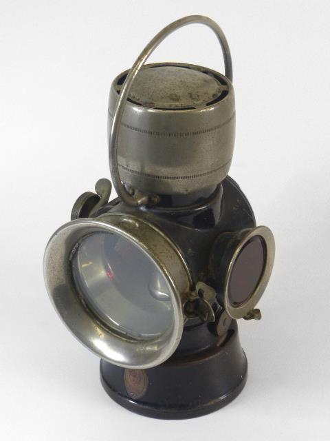 A Joseph Lucas, 630 Series Lamp. A combination number plate and rear oil-powered lamp with correct